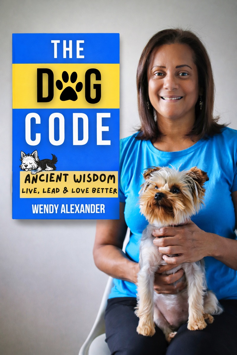 Wendy Alexander with Nala and The Dog Code book